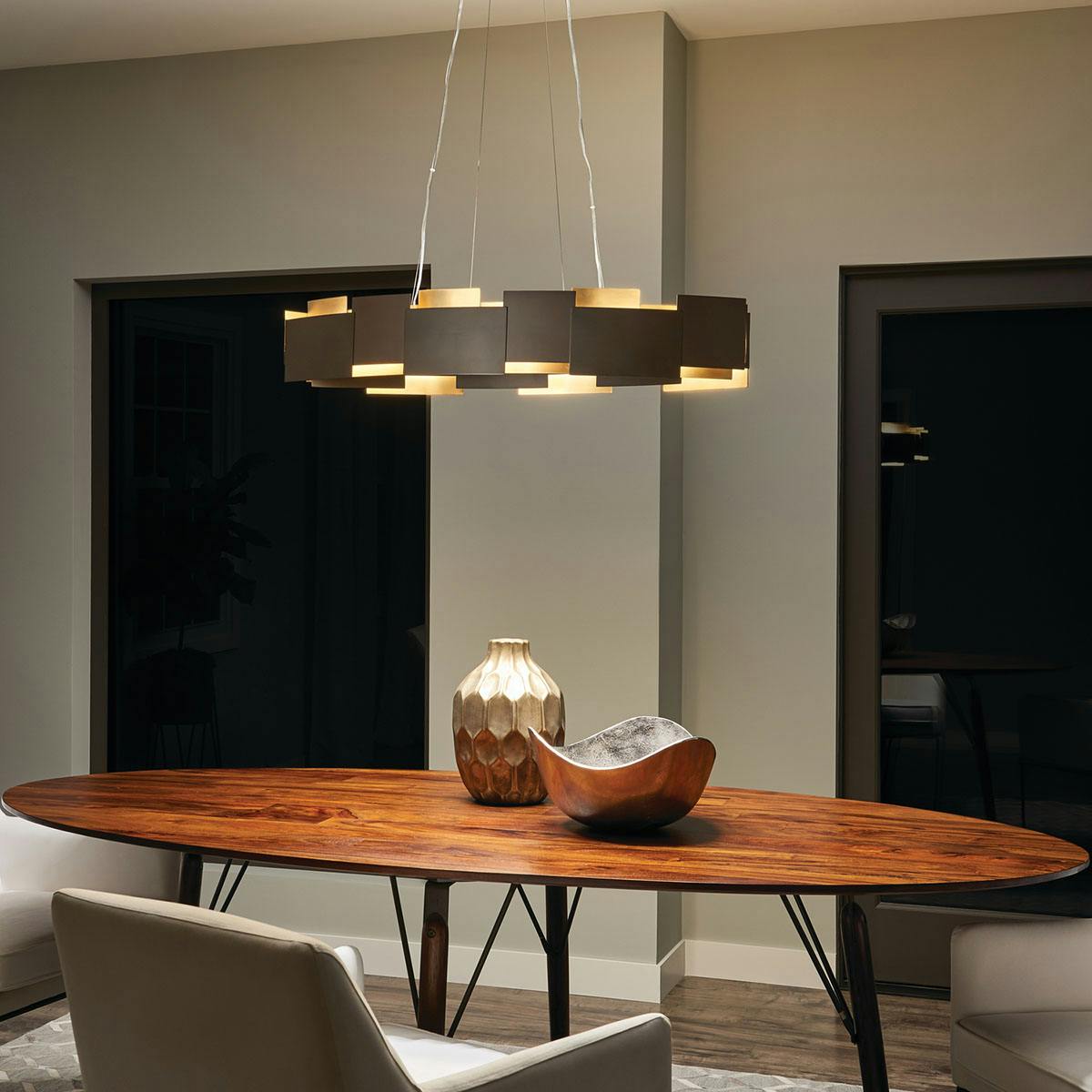 Night time dining room image featuring Moderne pendant 42993OZLED