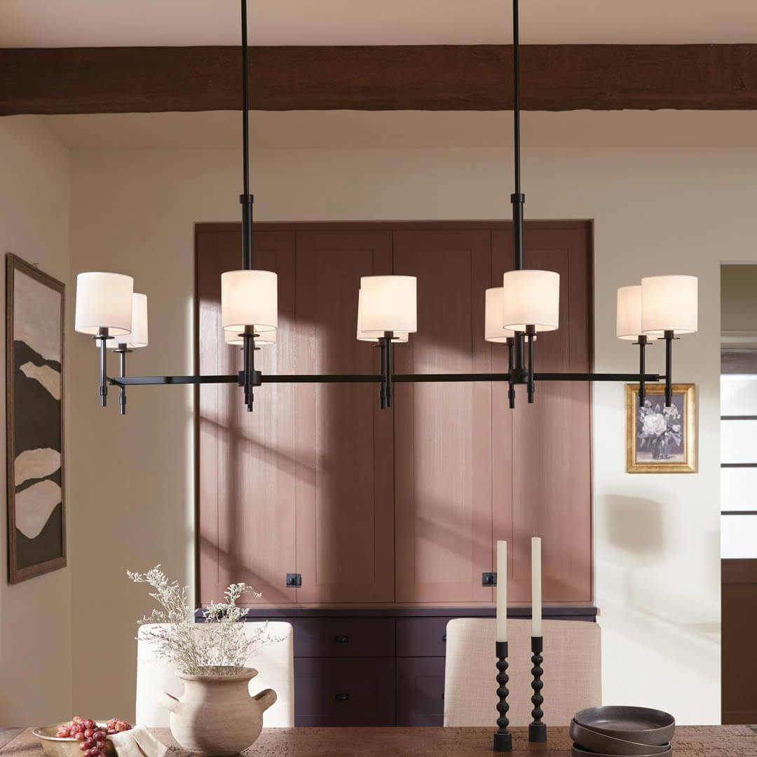 Day time dining room with Ali 56.5" 10 Light Linear Chandelier Black