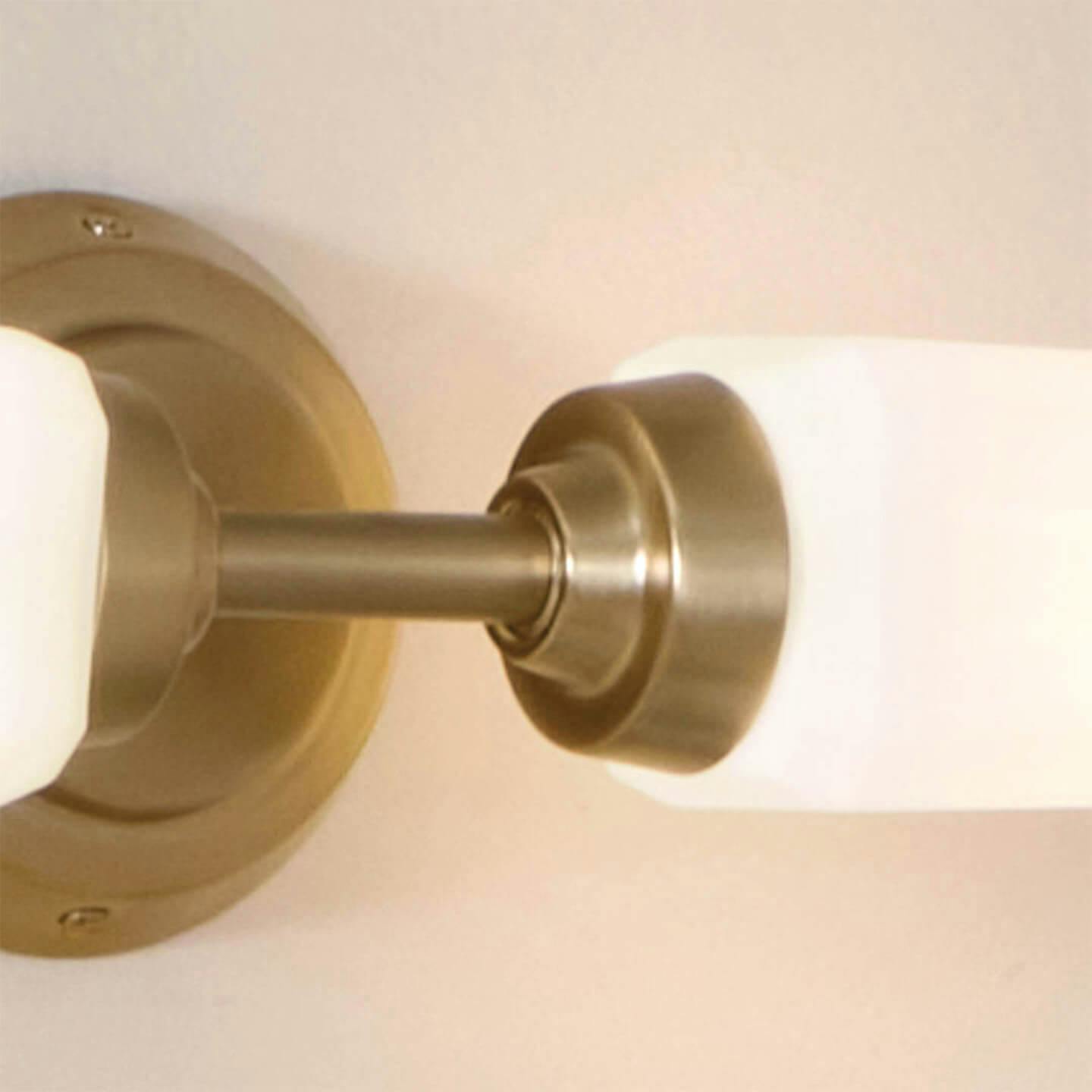 Detail shot of Truby 2 light sconce with gold finish