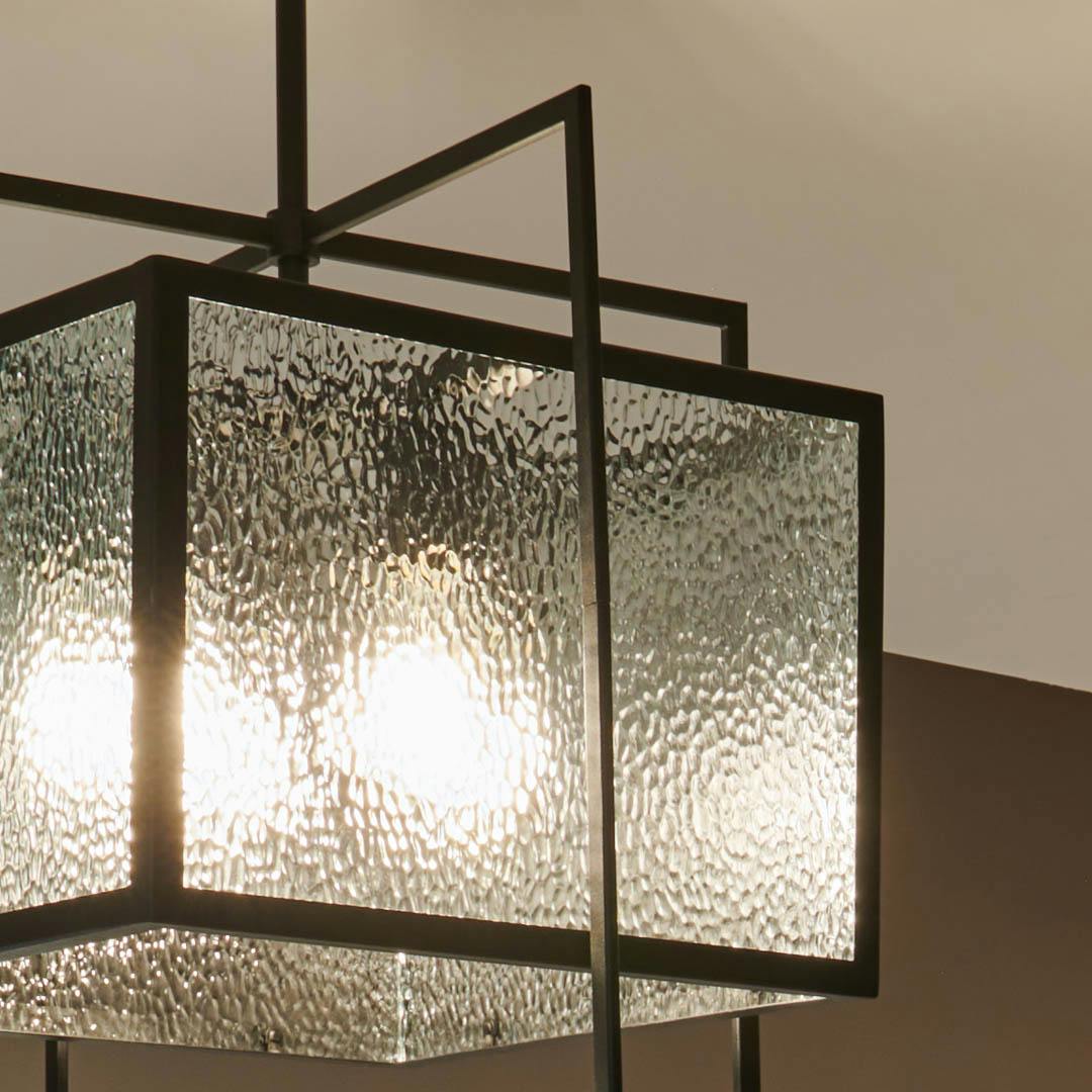 Day time foyer with Edinborough 4 Light Pendant in Textured Black with Clear Hammered Glass