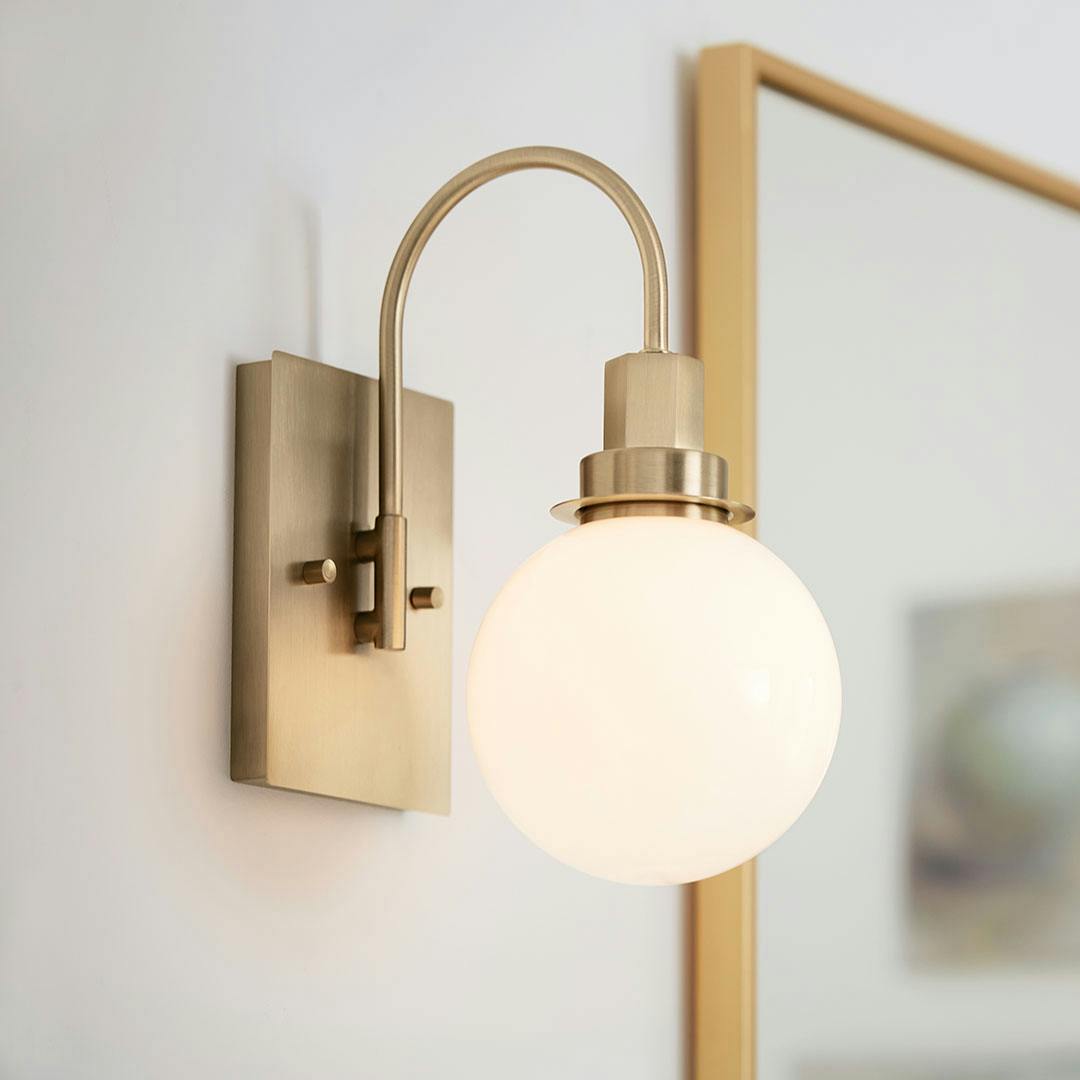 Bathroom with the Hex 11.5 Inch 1 Light Wall Sconce with Opal Glass in Champagne Bronze