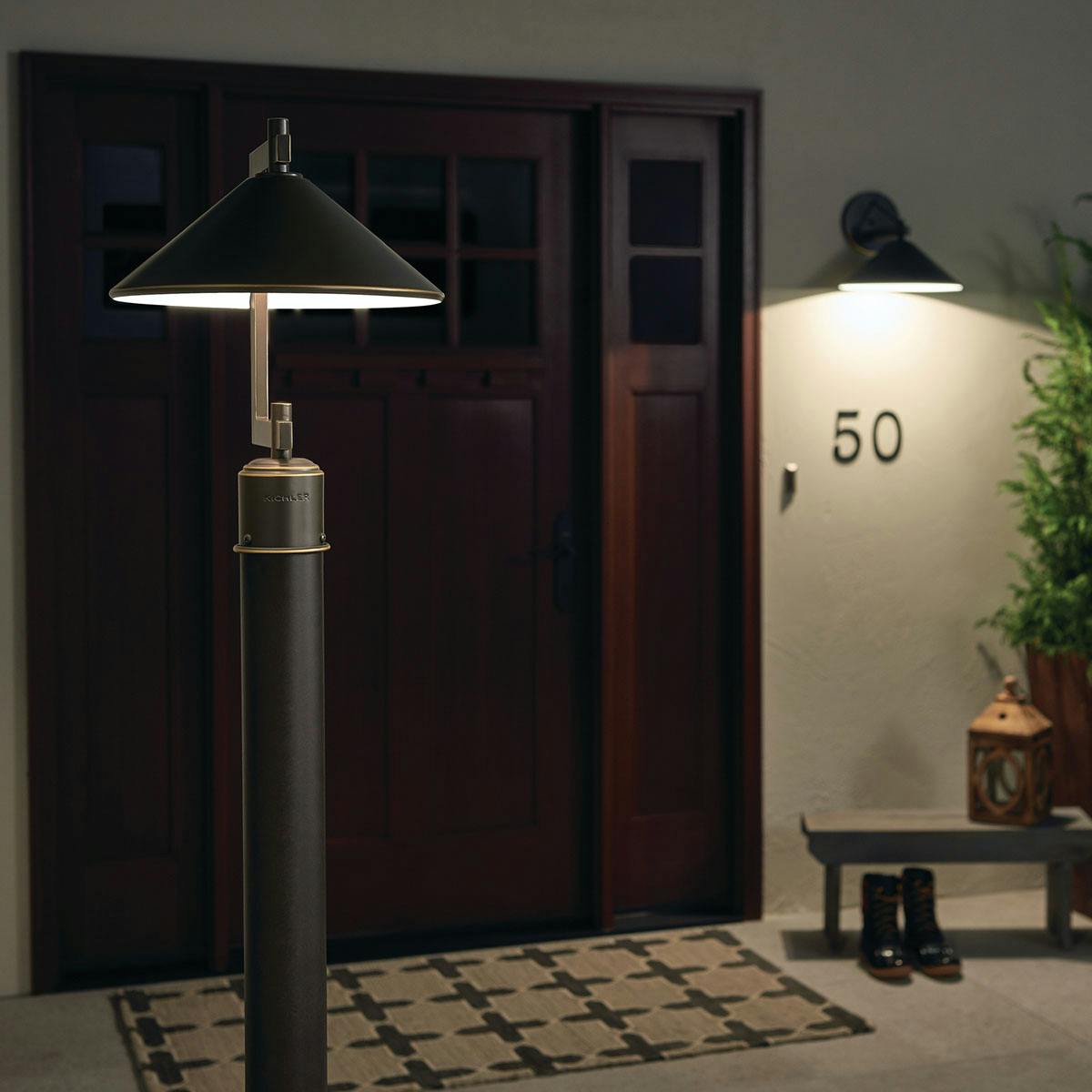 Night time Exterior image featuring Ripley outdoor post light 49063OZ