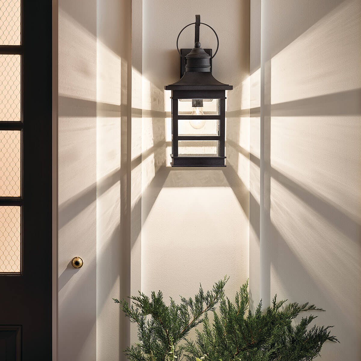Night time outdoor entryway image featuring Grand Ridge outdoor wall light 39537