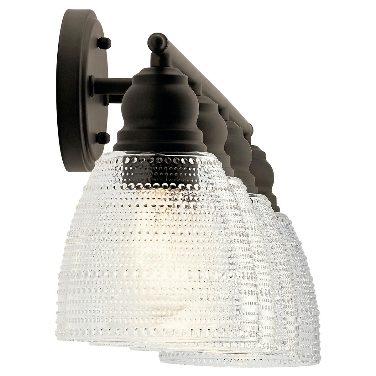 Profile view of the Karmarie 4 Light Vanity Light Olde Bronze on a white background