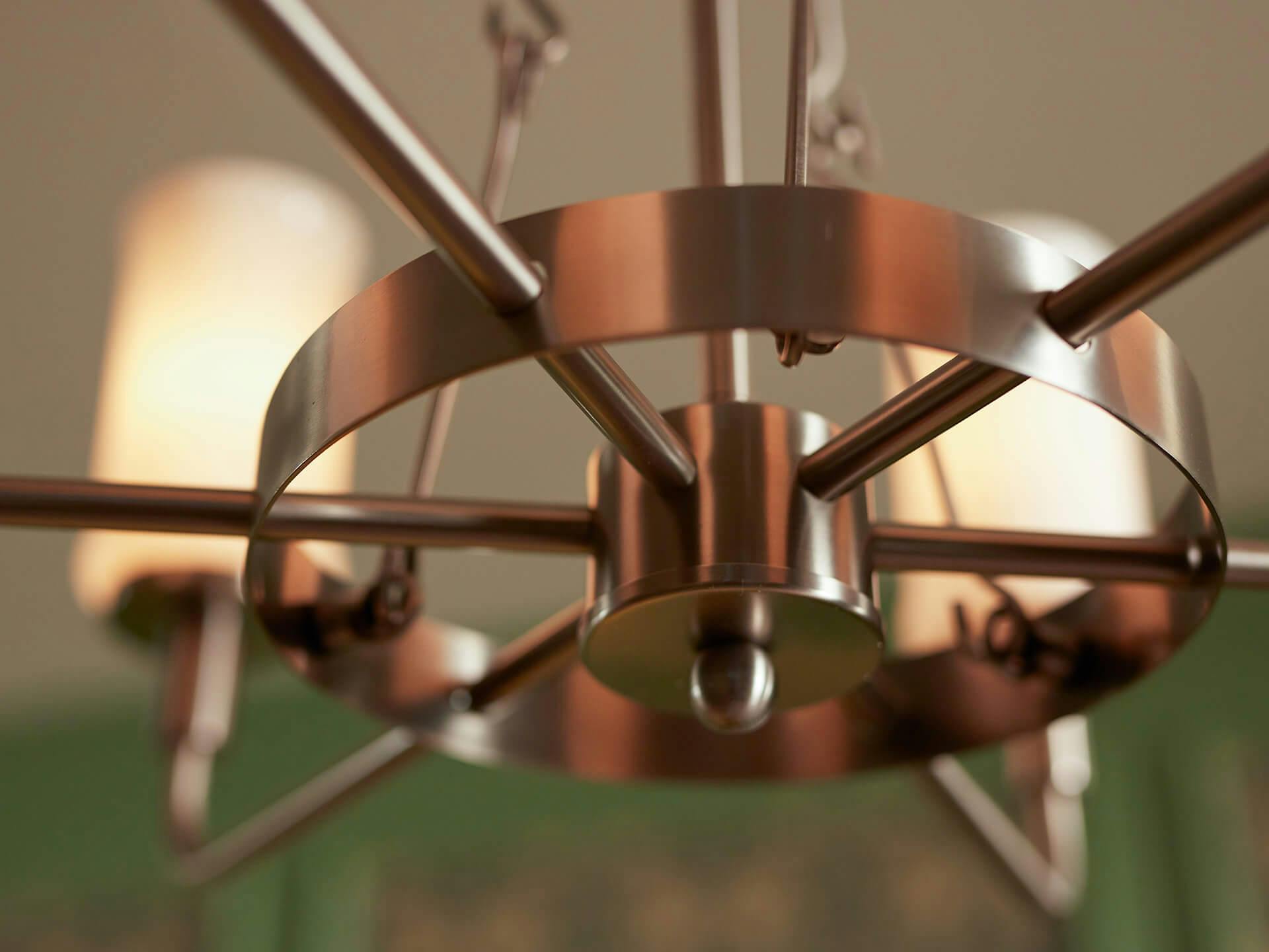 Close up of a Vetivene chandelier in brass