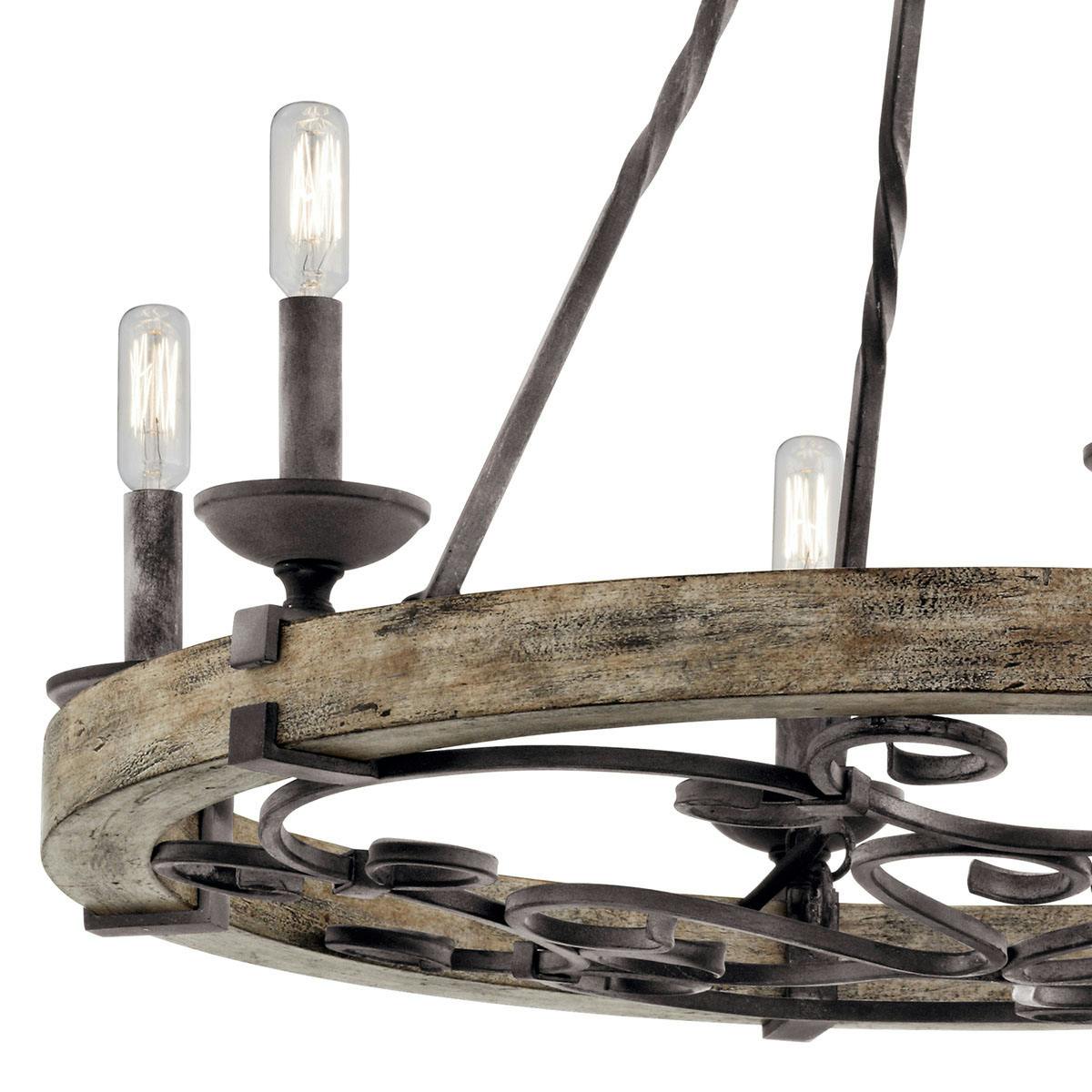 Close up view of the Taulbee 6 Light Chandelier Weathered Zinc on a white background