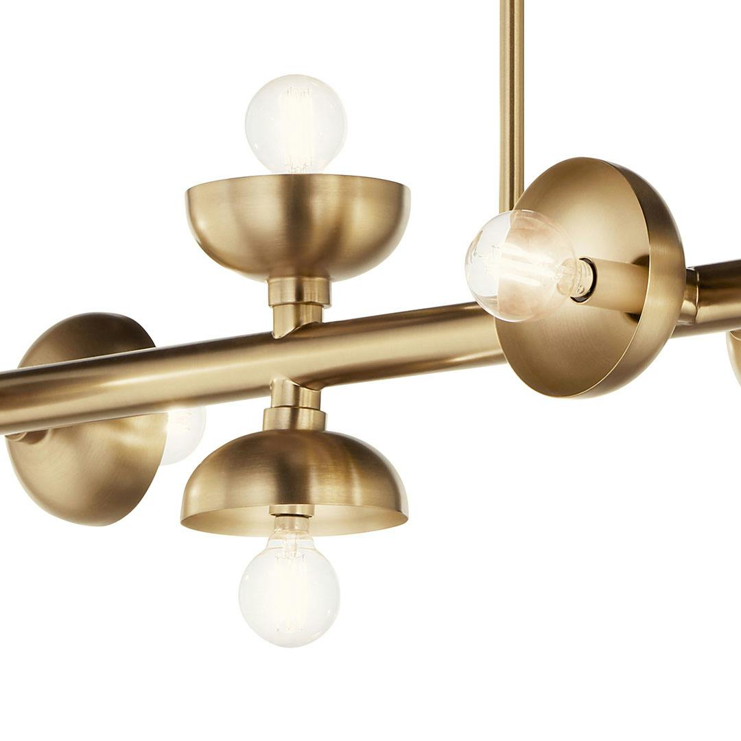 Close up view of the Palta 48 Inch 10 Light Linear Chandelier in Champagne Bronze
