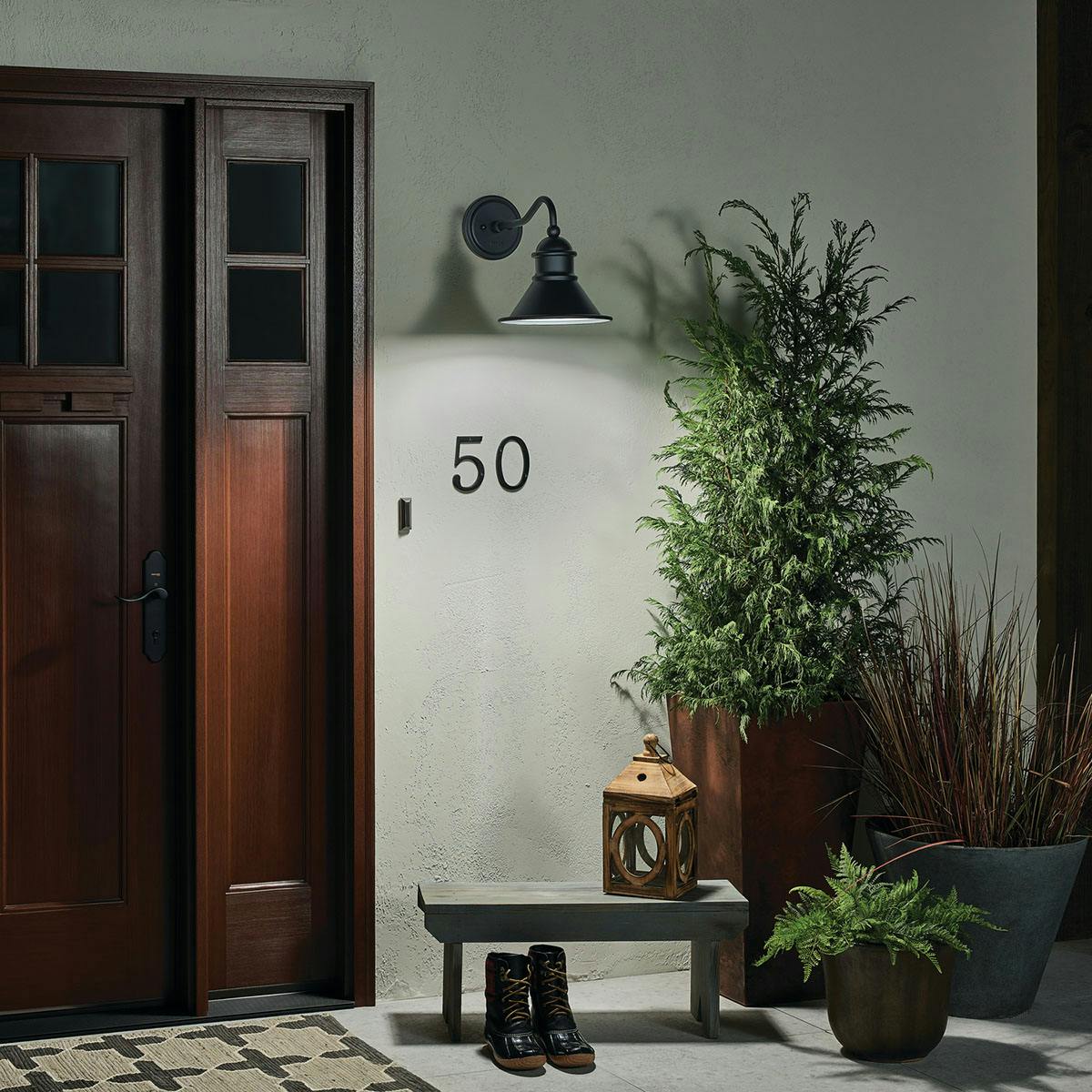 Night time Exterior image featuring Northland outdoor wall light 49775BK
