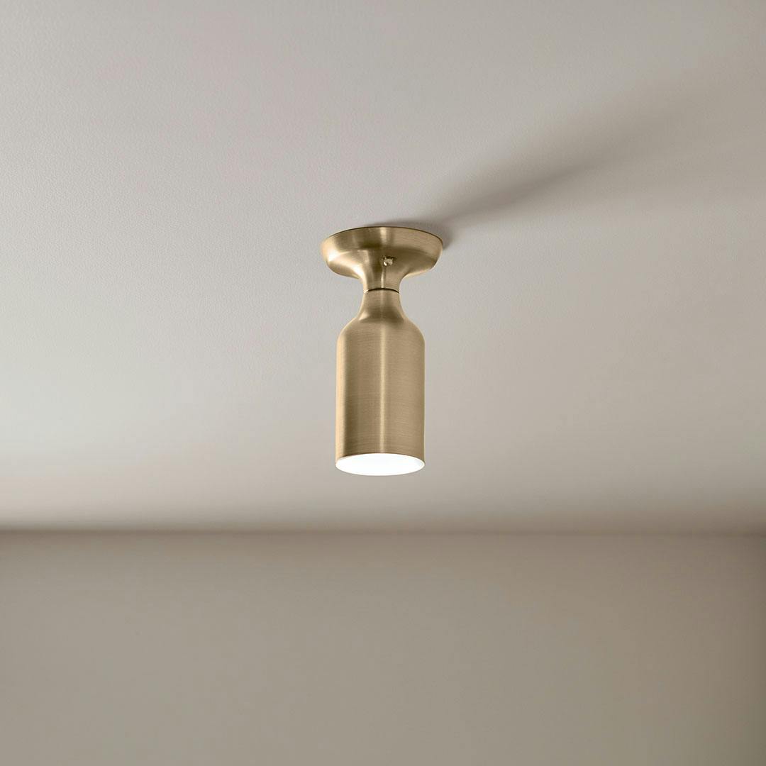 Living room in the day time with the Sisu 9 Inch 1 Light Semi Flush in Champagne Bronze