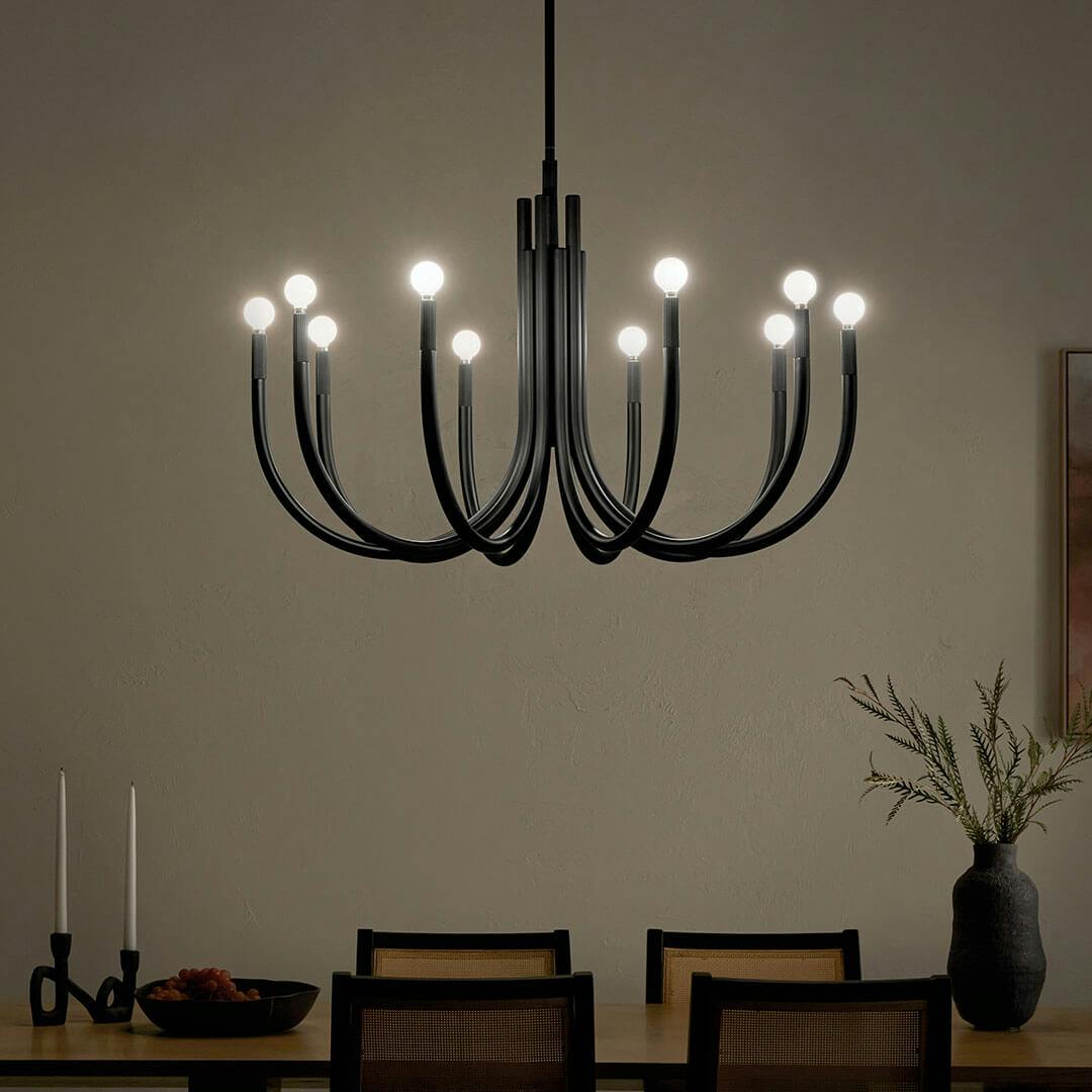 Night time dining room with the Odensa 40.25 Inch 10 Light Chandelier in Black
