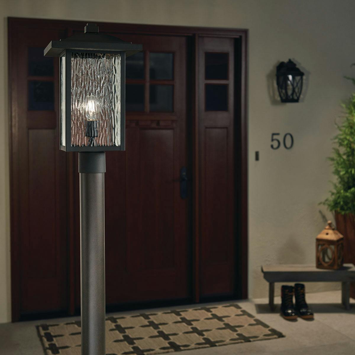 Night time Exterior image featuring Capanna outdoor post light 49927BKT