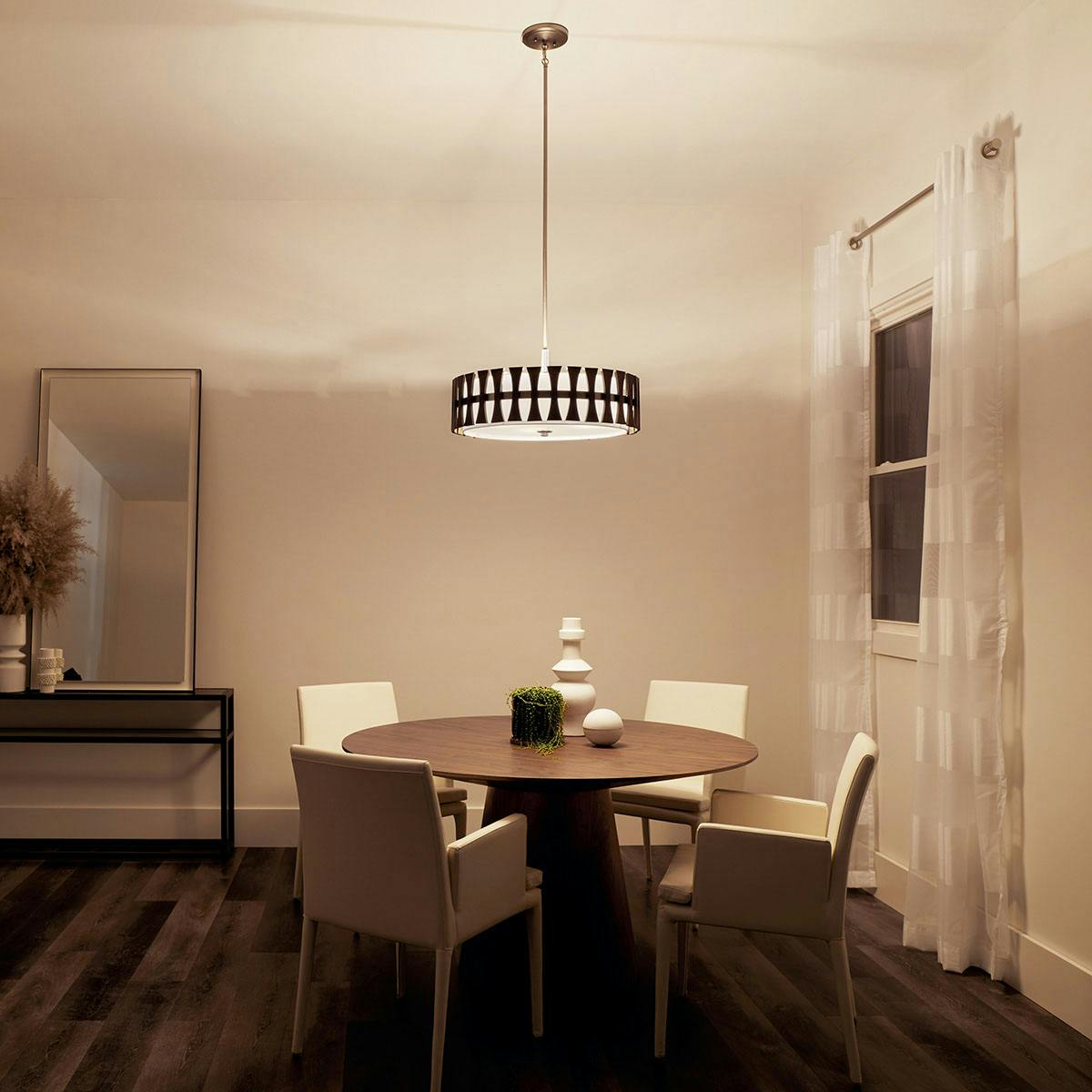 Night time dining room image featuring Cirus flush mount light 43753AUB