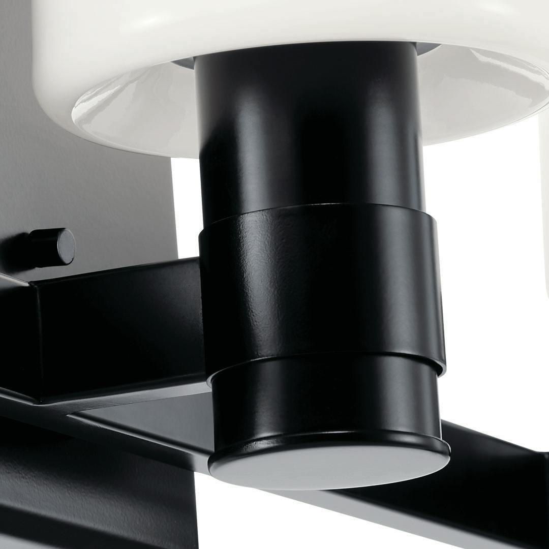 Close up view of the Adani 30 Inch 4 Light Vanity Light with Opal Glass in Black on a white background