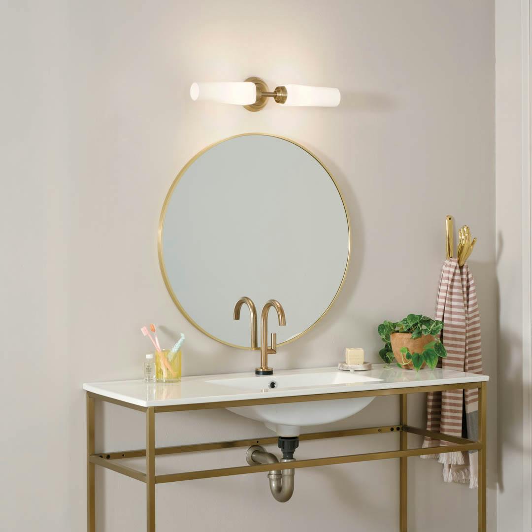 Day time bathroom with Truby 19.75 Inch 2 Light Vanity Light with Satin Etched Cased Opal Glass in Champagne Bronze