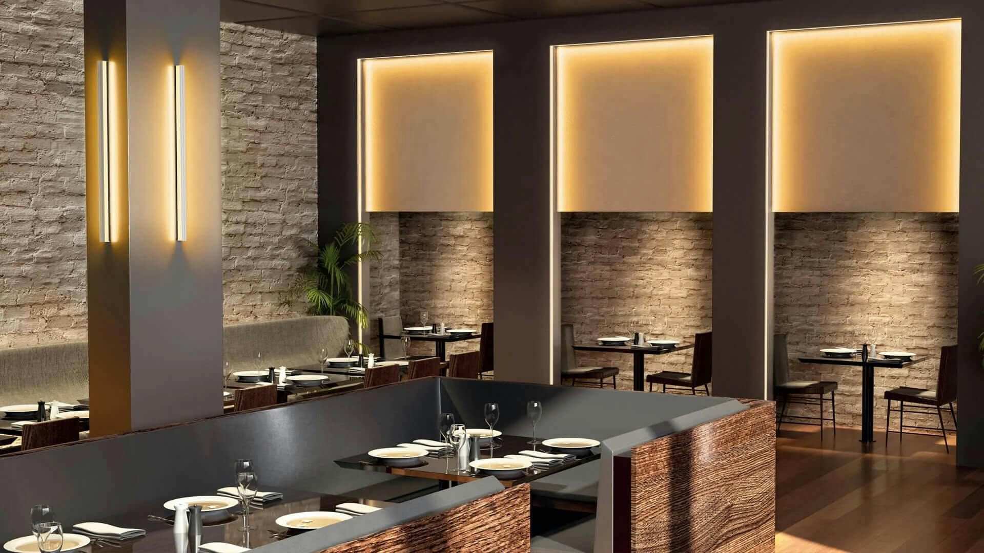 Interior of a restaurant featuring warm channel lighting in the walls