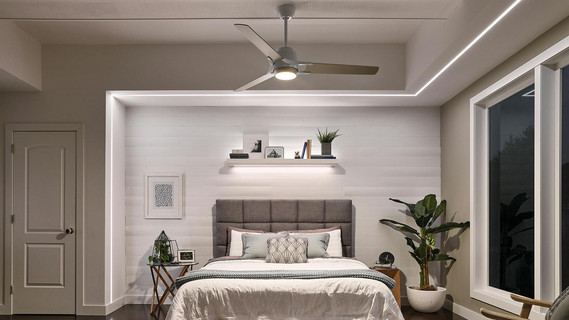 bedroom with Kichler fan and lighting