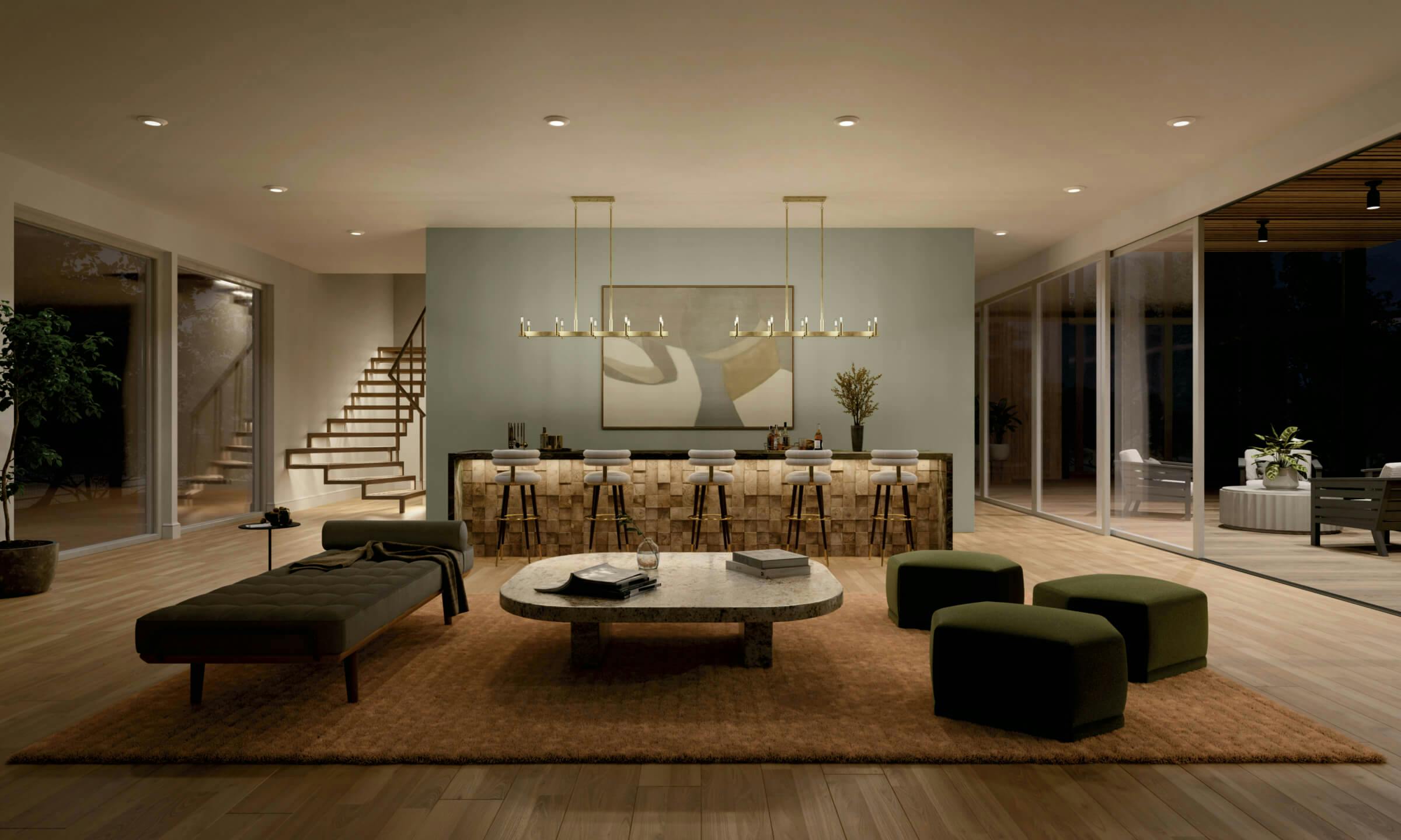 Living room with bar in background and two Erzo linear chandeliers in brushed natural brass