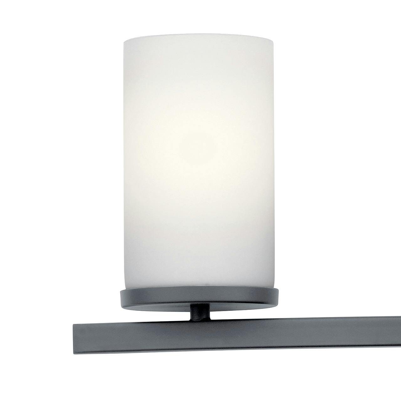 Close up view of the Crosby 4 Light Vanity Light Black on a white background