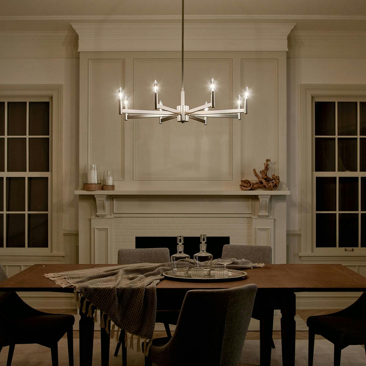 Night time dining room image featuring Erzo chandelier 43857SN