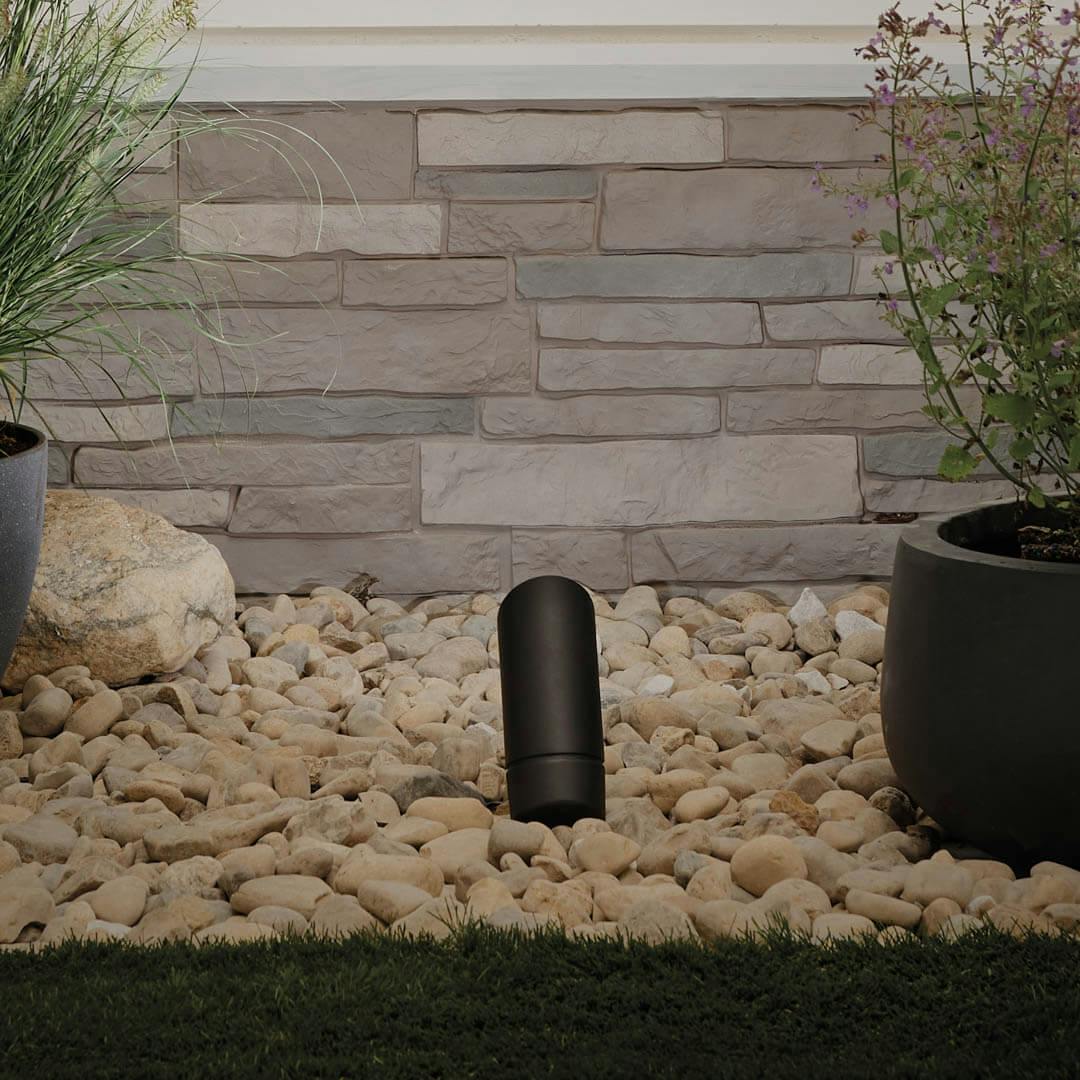 Night time outdoors with 12V Adjustable Drop-In LED Accent Kit in Textured Black